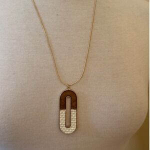 V Logo Gold Tone Wood and Raffia Woven Oblong Pendant Adjustable Snake Chain
